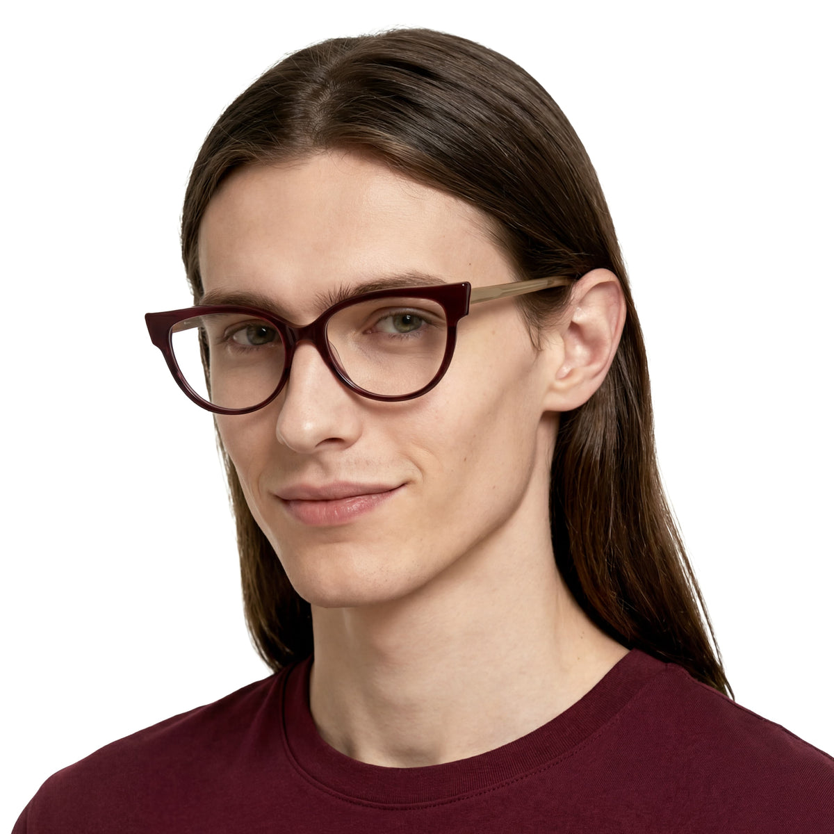 Woman wearing a pair of glasses with a plain background