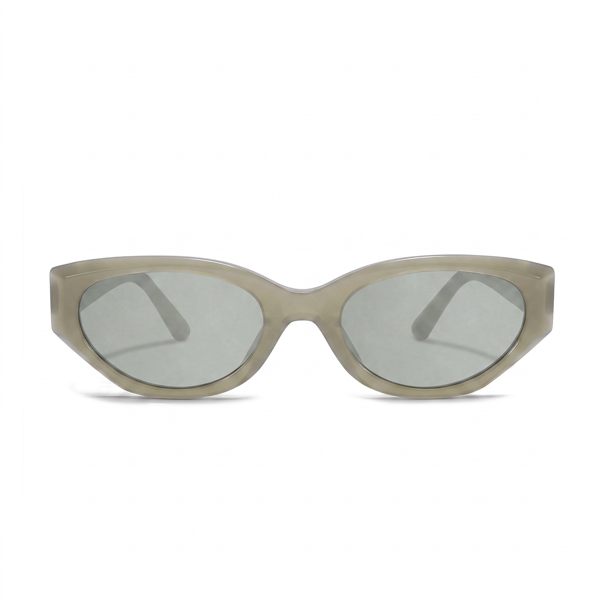 Oversized cat-eye sunglasses with a translucent taupe frame and light gray lenses, shown from the front on a white background.