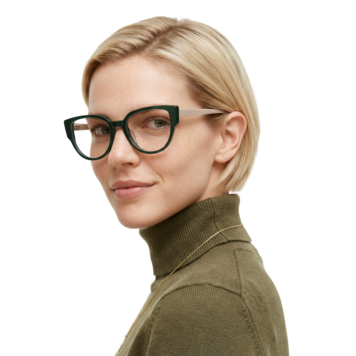 Woman wearing green glasses and a green turtleneck sweater on a white background