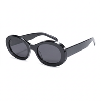 Black sunglasses with gradient lenses on a white background