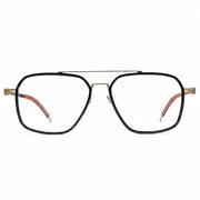 Black and gold eyeglasses on a white background