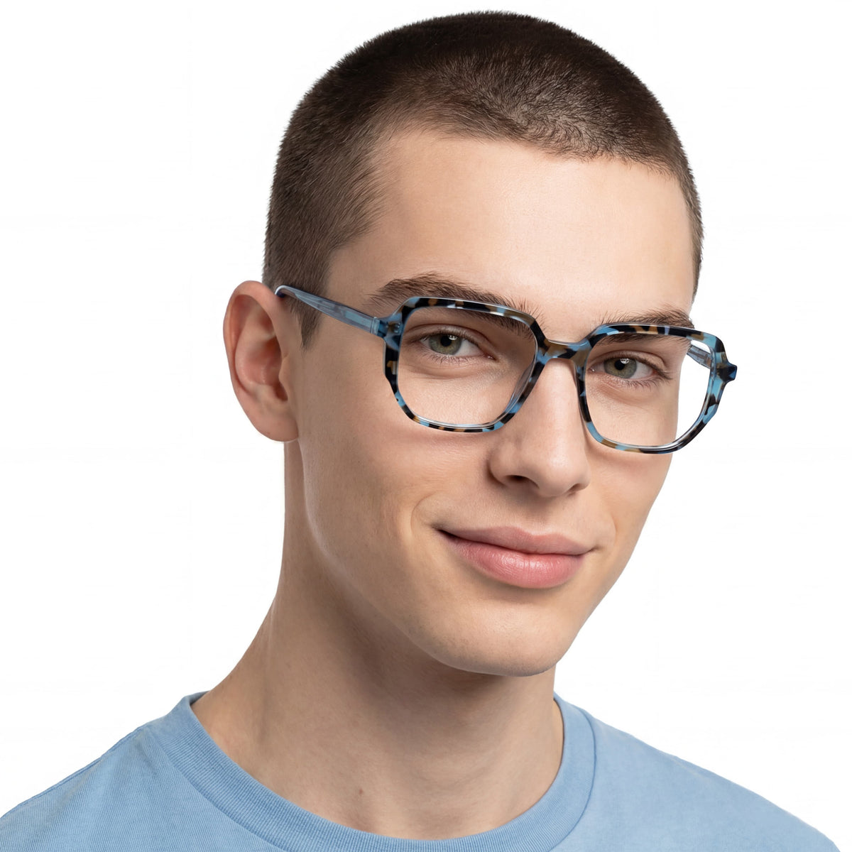 Person wearing blue eyeglasses on a white background