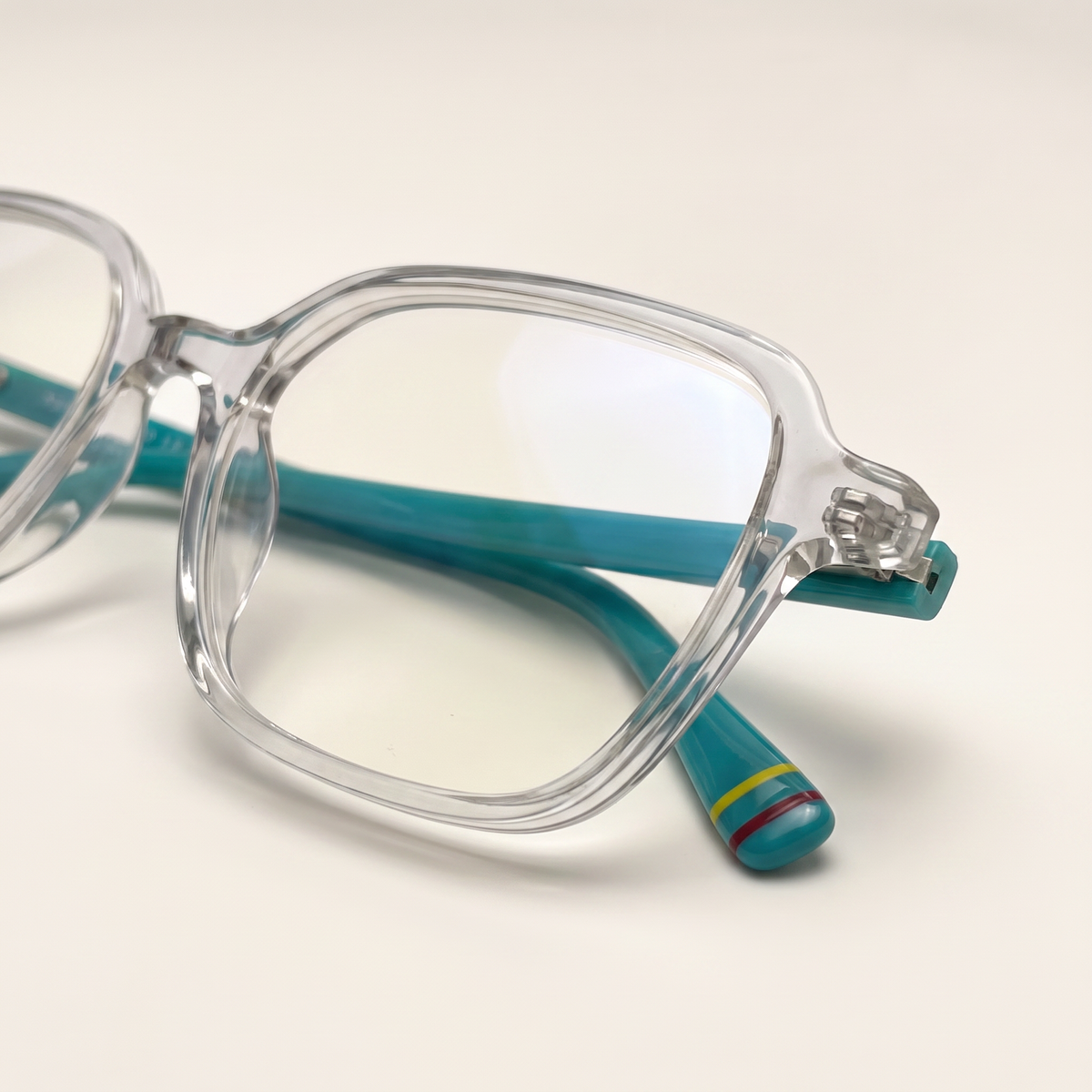 Featuring a classic square silhouette in mineral grey acetate, finished...