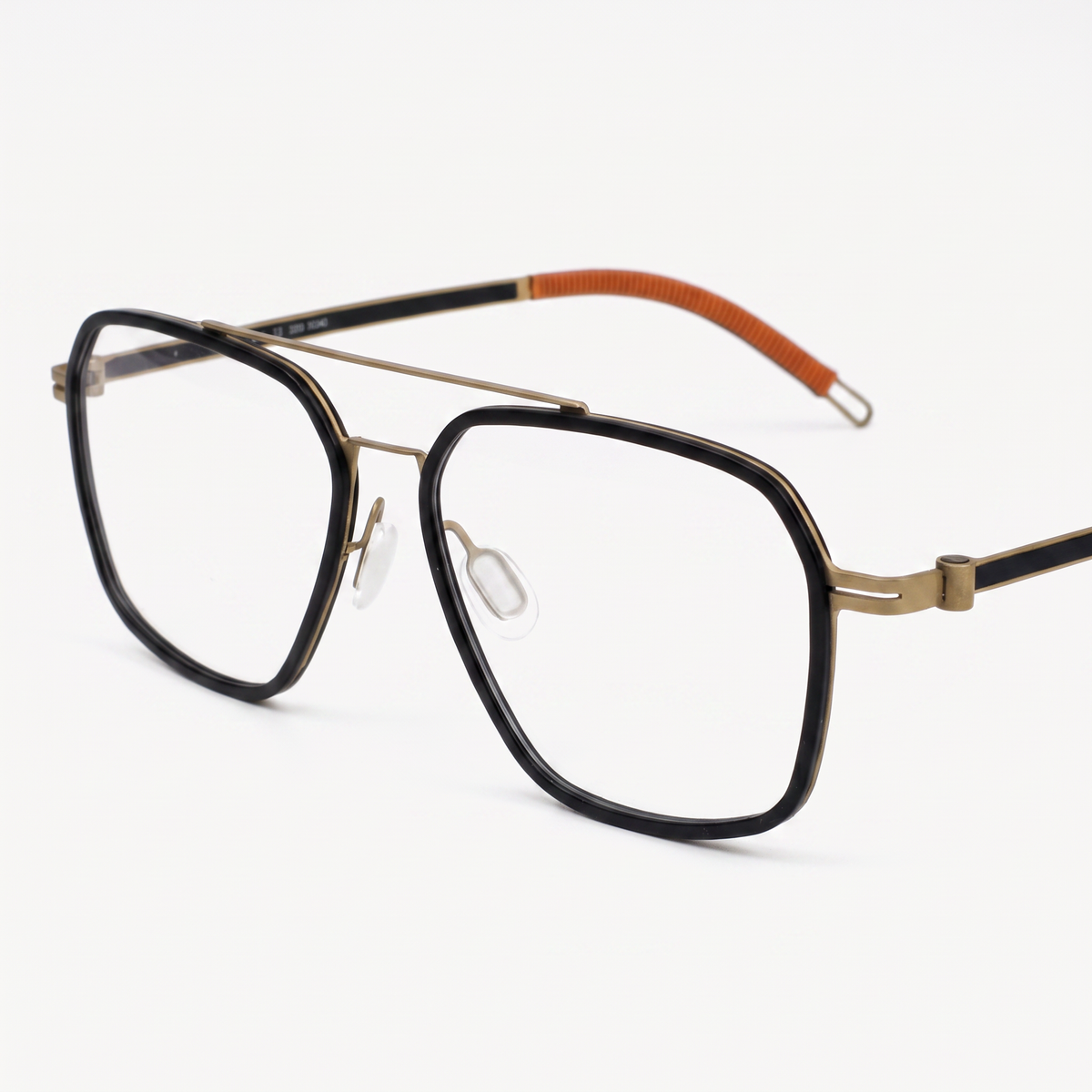 Featuring a classic aviator silhouette in black gold titanium, finished...