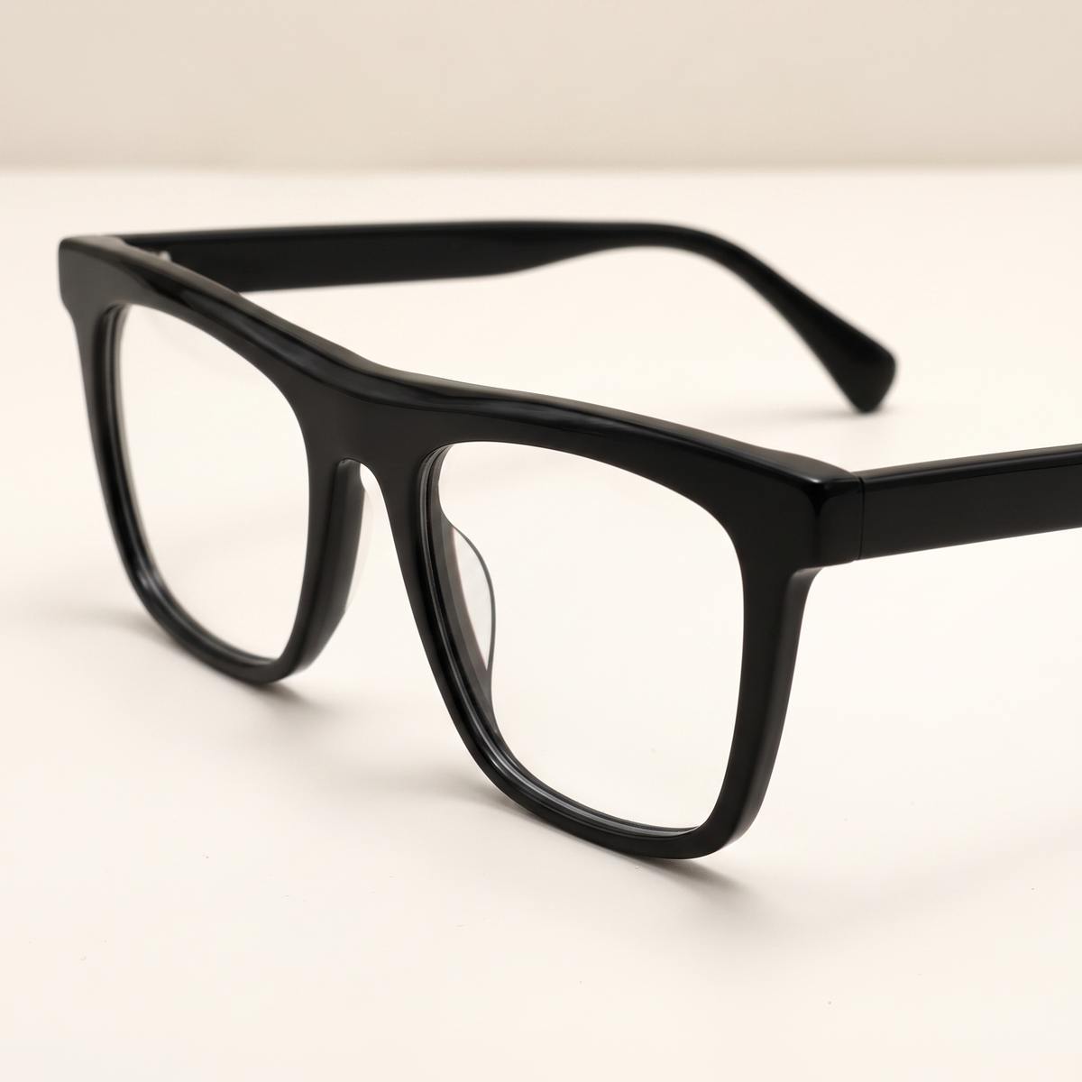 Featuring a classic square silhouette in black acetate, finished with...