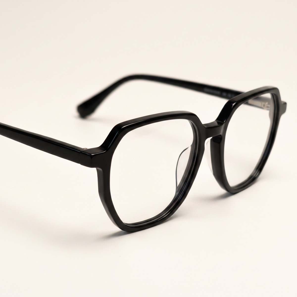 Featuring a classic square silhouette in black acetate, finished with...