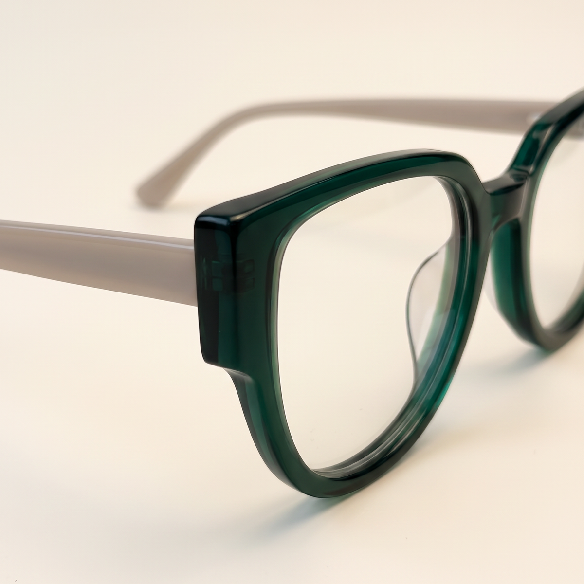 Featuring a classic geometric silhouette in black red acetate, finished...