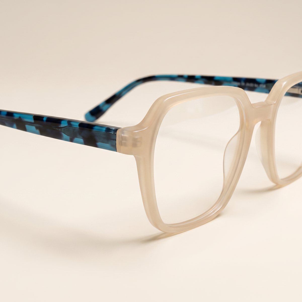 Featuring a classic round silhouette in deep green acetate, finished...