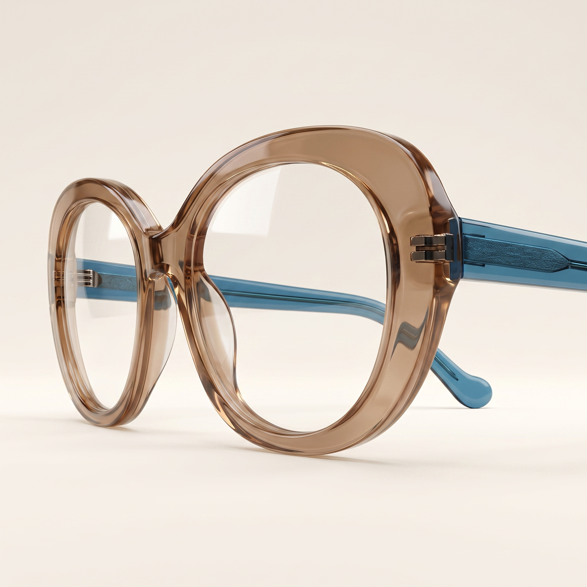 Featuring a classic cat-eye silhouette in teal acetate, finished with...