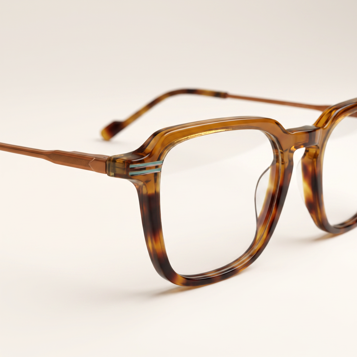 Featuring a classic rectangle silhouette in camouflage acetate, finished with...