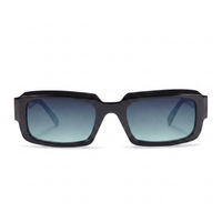 A pair of square sunglasses with a thick black frame and gradient blue-gray lenses, shown against a plain white background.