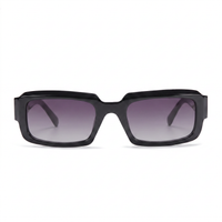 A pair of square sunglasses with a thick black frame and gradient gray-purple lenses, shown against a plain white background.
