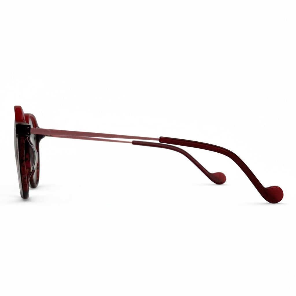 Sunglasses with red frame and dark lenses on a white background