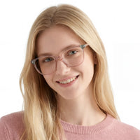 Woman wearing glasses with a plain white background