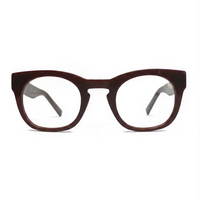 Brown cat-eye glasses on a white background