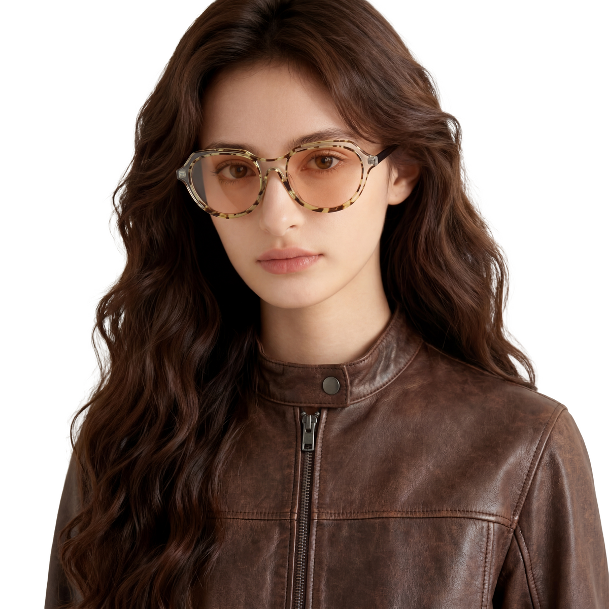 Woman wearing tortoiseshell glasses and a brown leather jacket on a white background