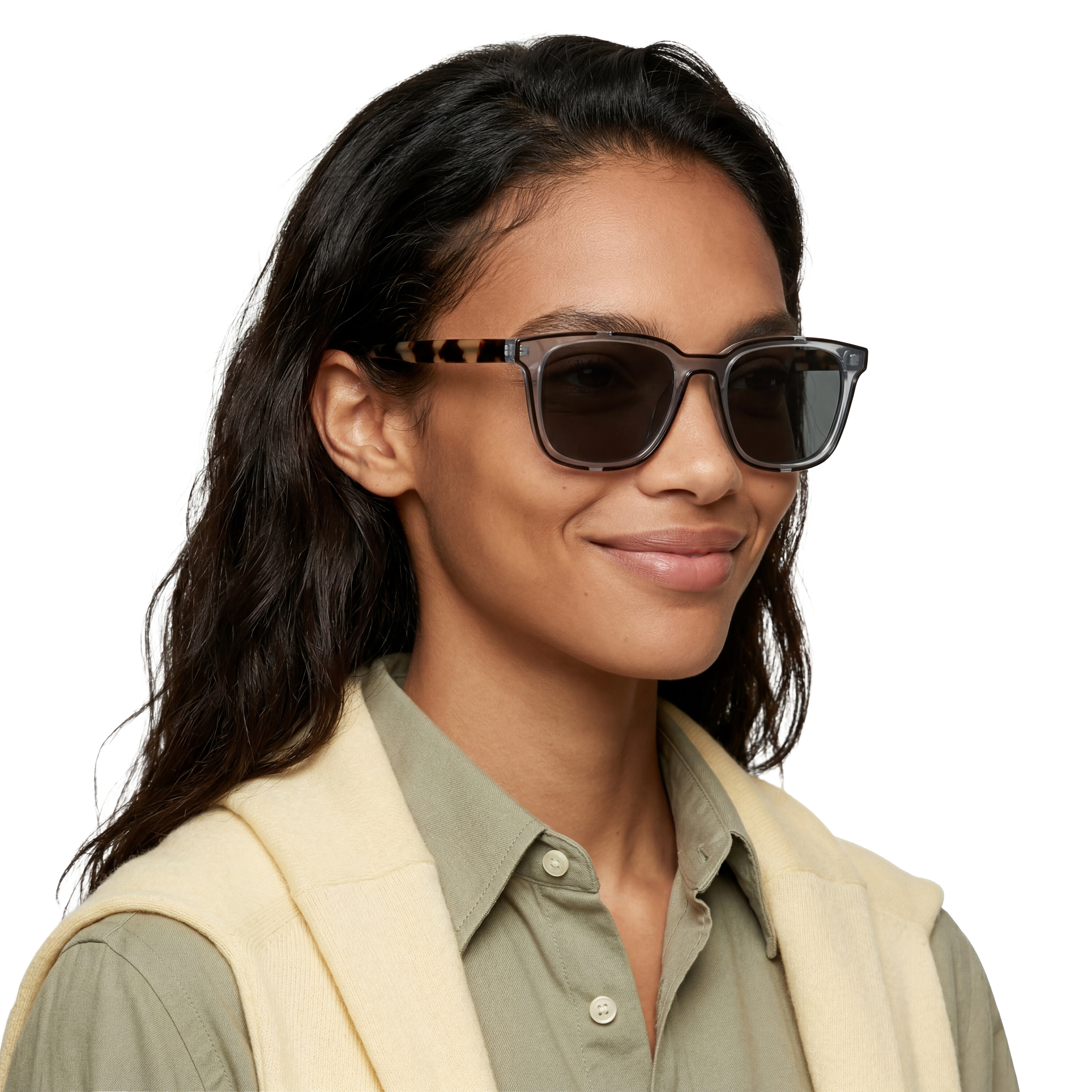 Woman wearing sunglasses with a neutral background