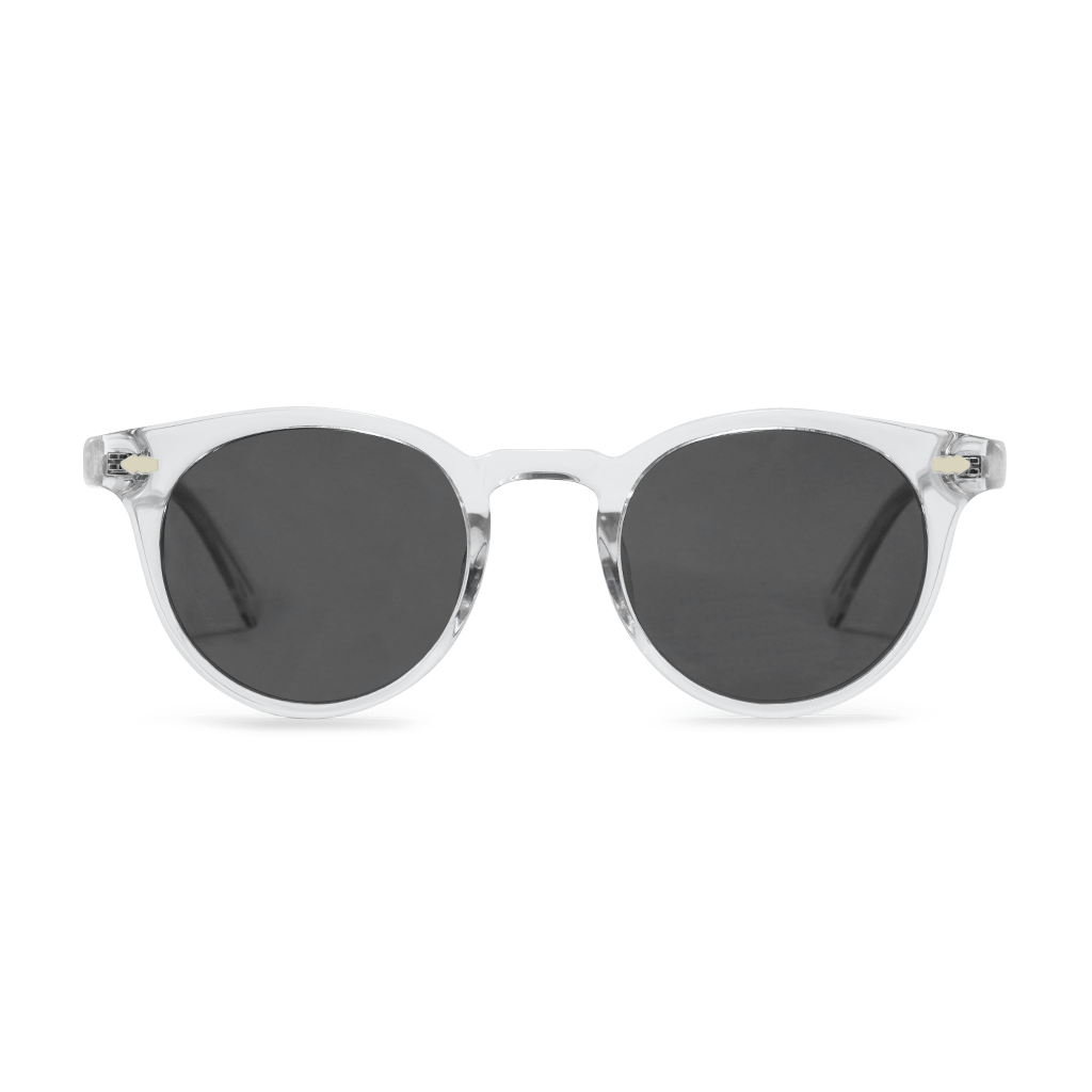 Round sunglasses with a translucent white acetate frame and dark gray lenses, shown from the front on a white background.