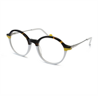 Eyeglasses with a black and gold frame on a white background
