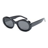 Sunglasses with tortoiseshell frame and brown lenses on a white background