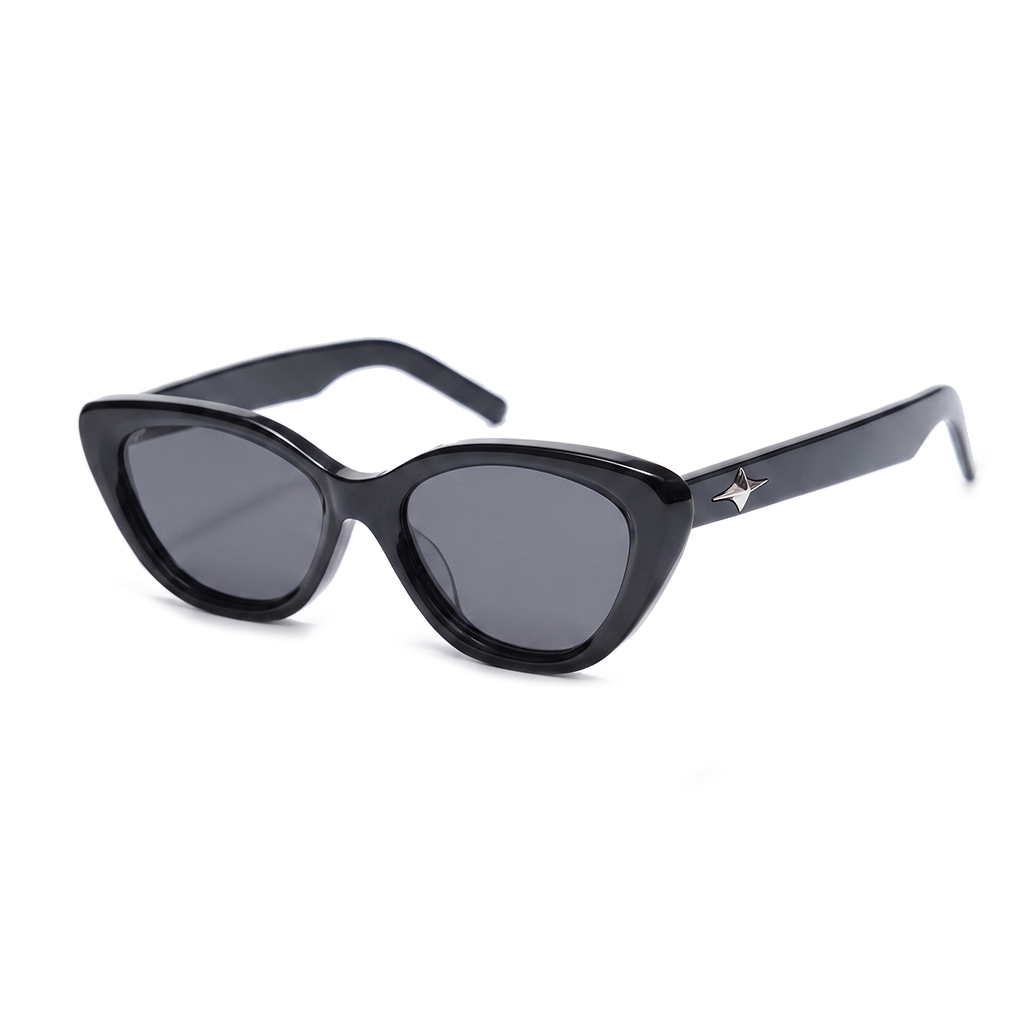 Black cat-eye sunglasses with dark gray lenses and a small silver star logo on the temple, shown on a plain white background.