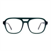 Green eyeglasses on a white background
