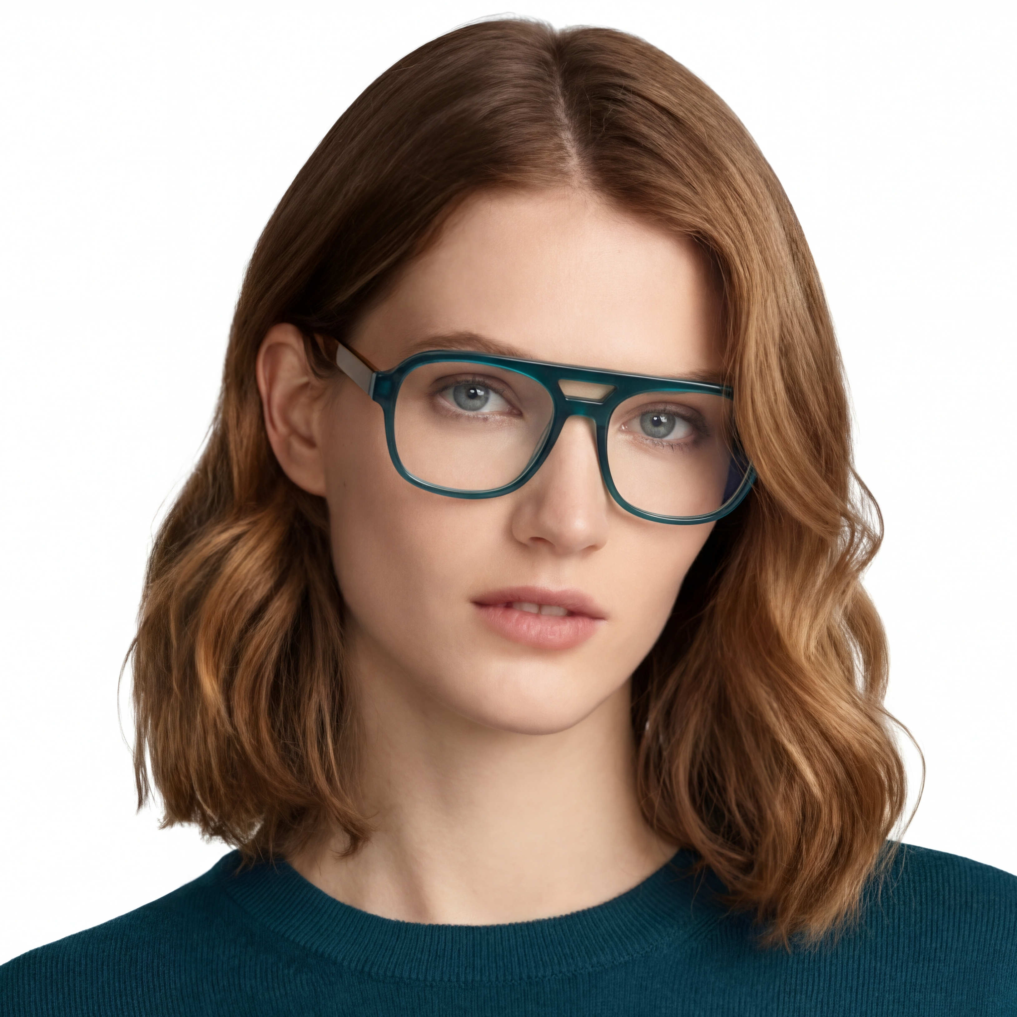 Woman wearing teal glasses against a white background