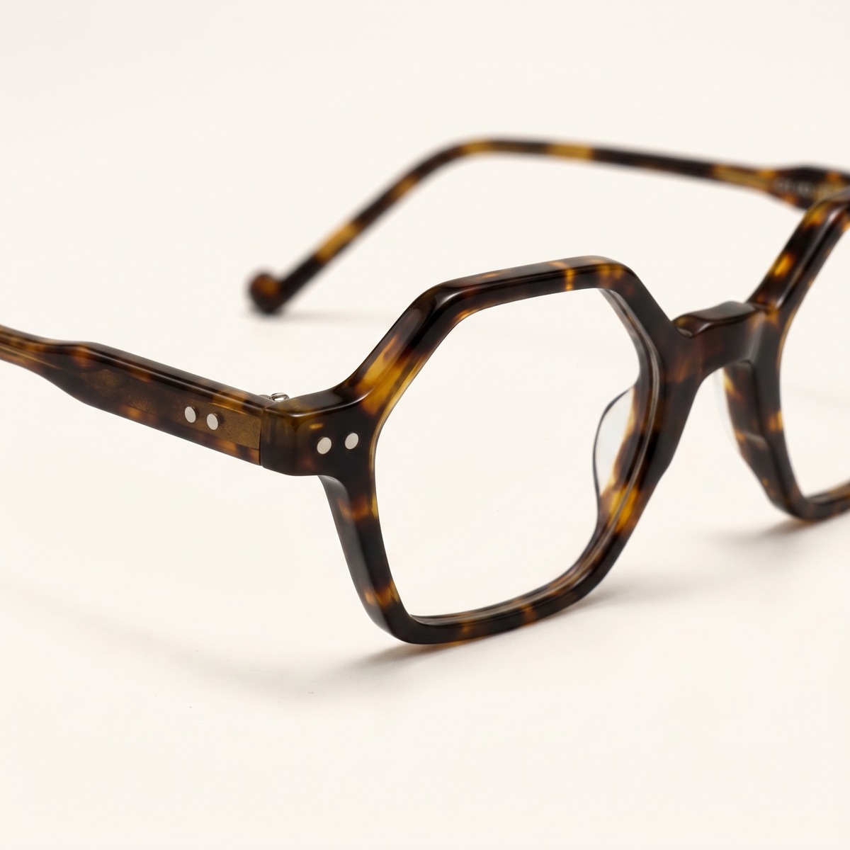 Featuring a classic classic full-rim silhouette in tortoiseshell acetate, finished...