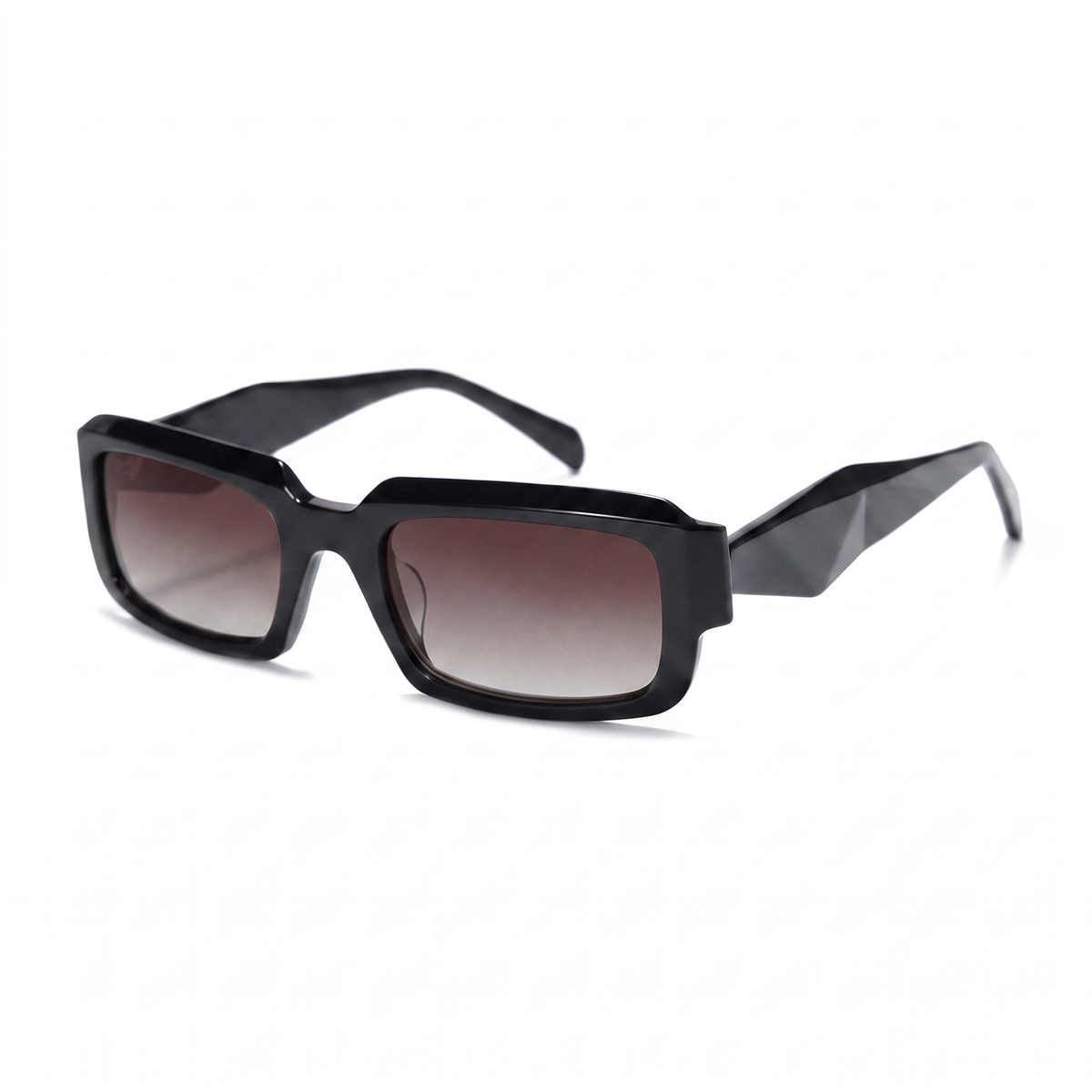 Sunglasses with tortoiseshell frame and gradient lenses on a white background