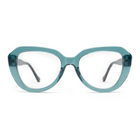 Teal cat-eye glasses on a white background