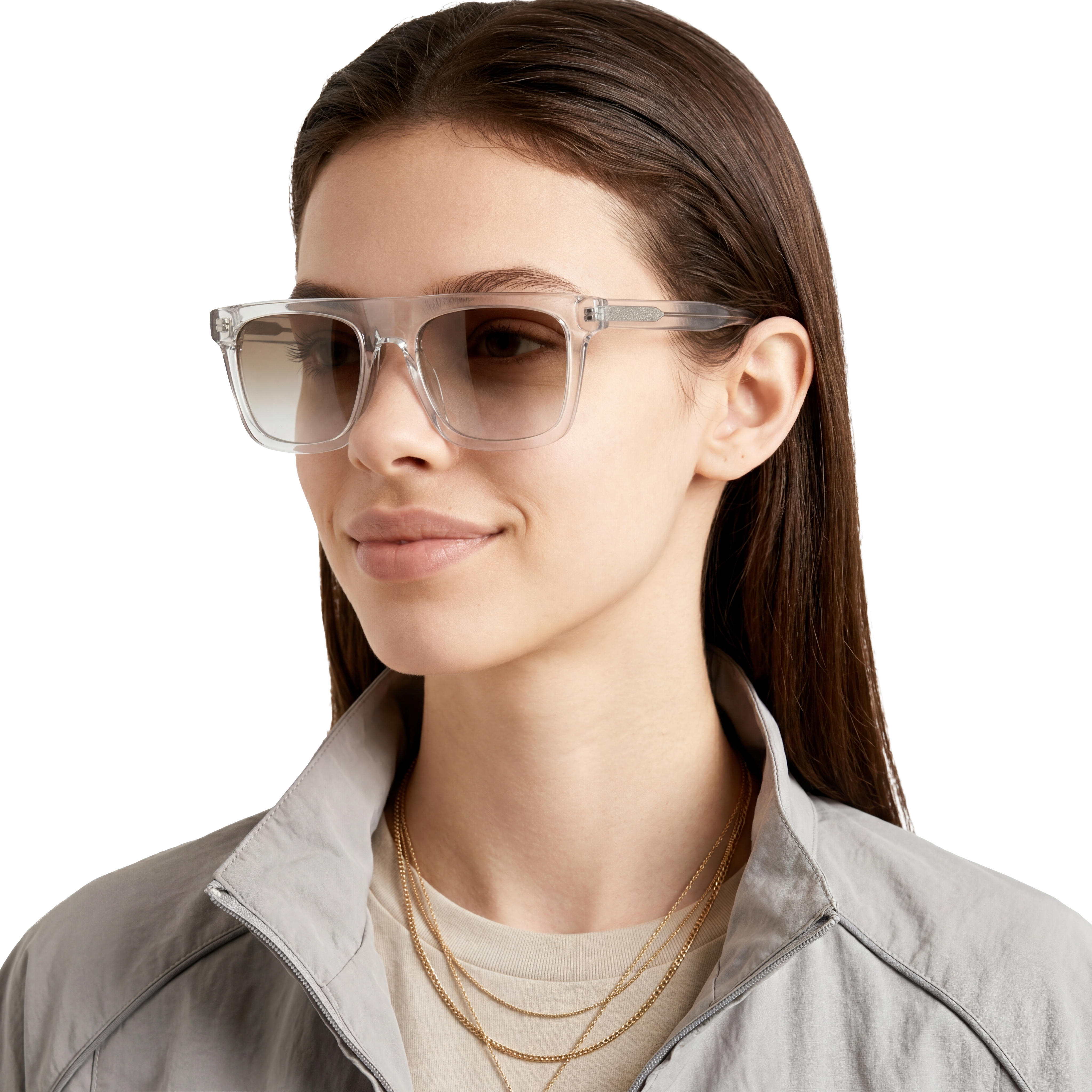 Woman wearing clear sunglasses with a neutral background