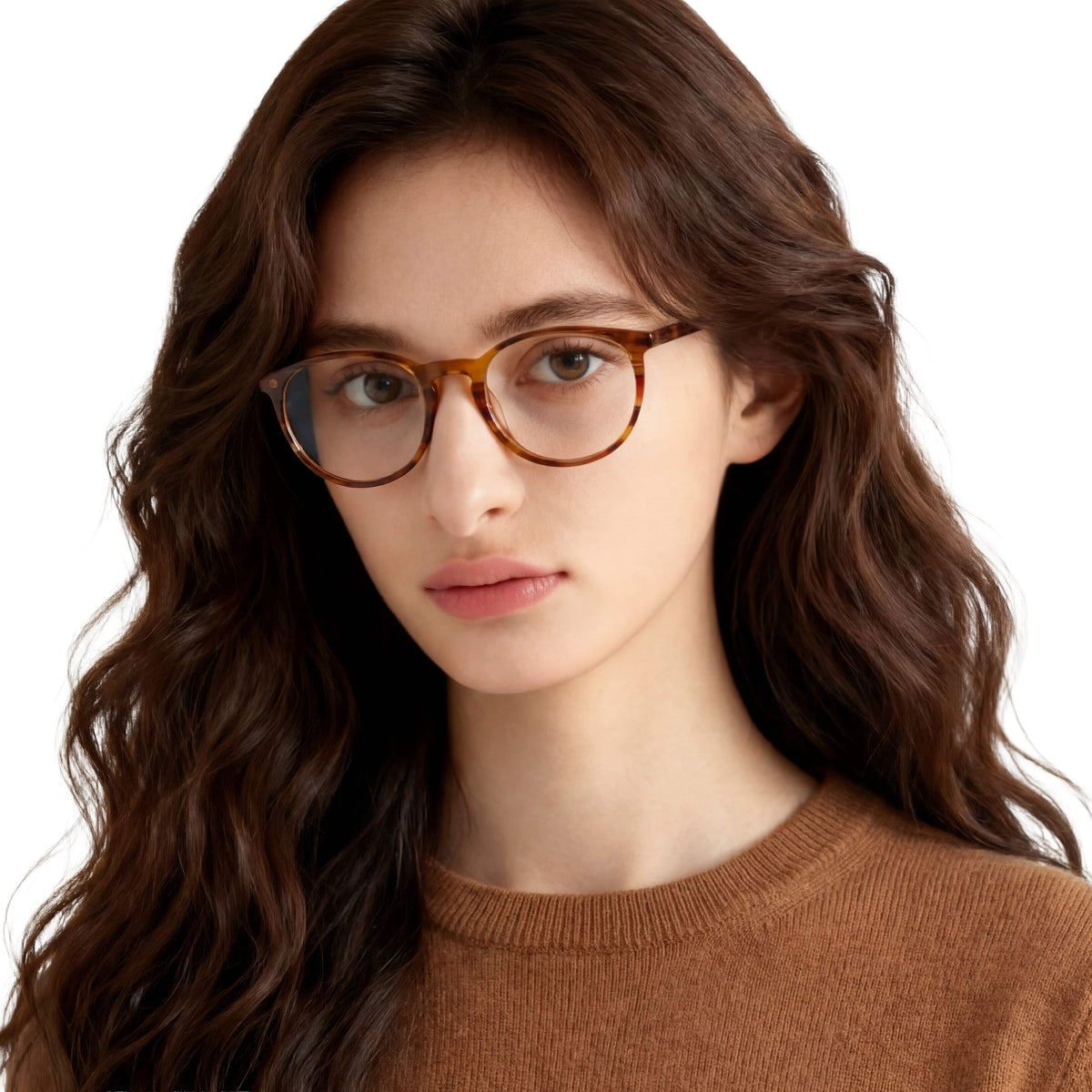 Woman wearing glasses with a brown sweater on a white background