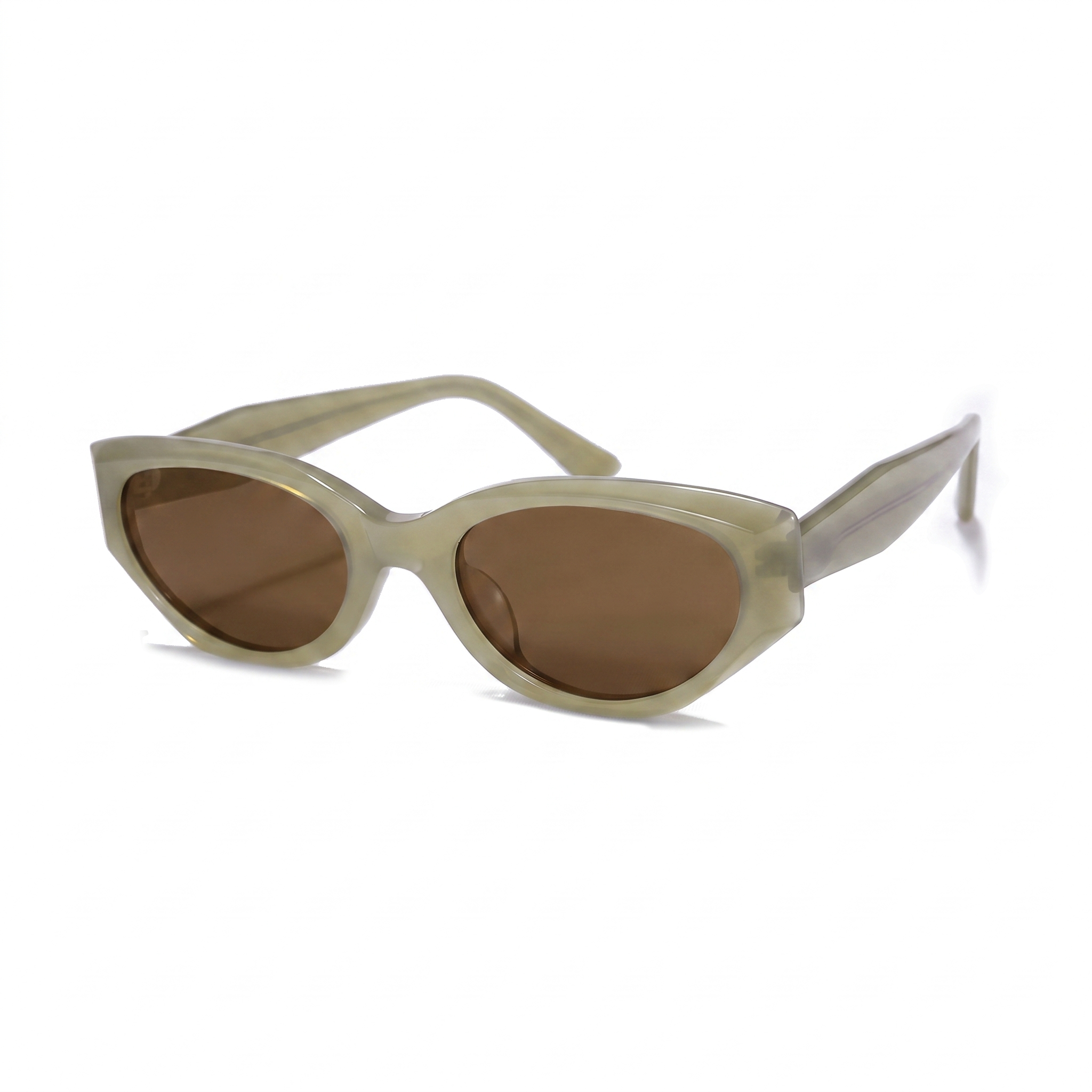 Oversized cat-eye sunglasses with a translucent light olive green acetate frame and brown tinted lenses, shown on a plain white background.