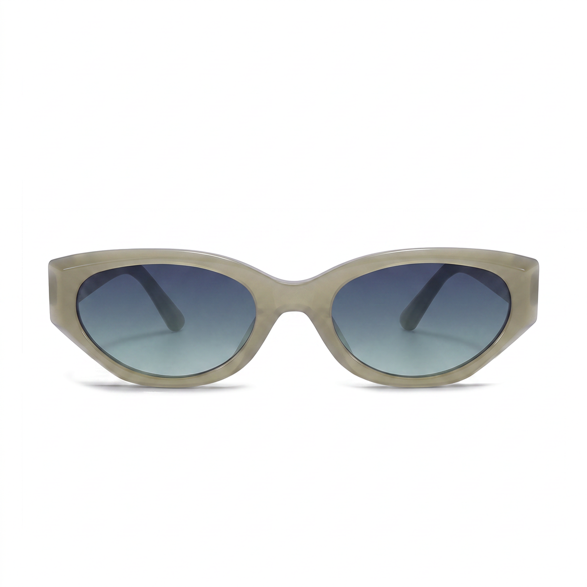 Oversized cat-eye sunglasses with a translucent light beige frame and blue gradient lenses, shown against a plain white background.