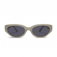 Oval sunglasses with a translucent light olive green acetate frame and dark gray lenses, shown from a front-facing perspective on a white background.