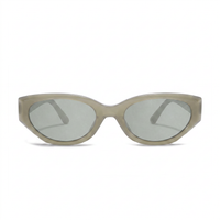 Oversized cat-eye sunglasses with a translucent taupe frame and light gray lenses, shown from the front on a white background.