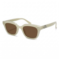 Cream acetate sunglasses with brown lenses, featuring a small silver logo emblem on the temple arm.