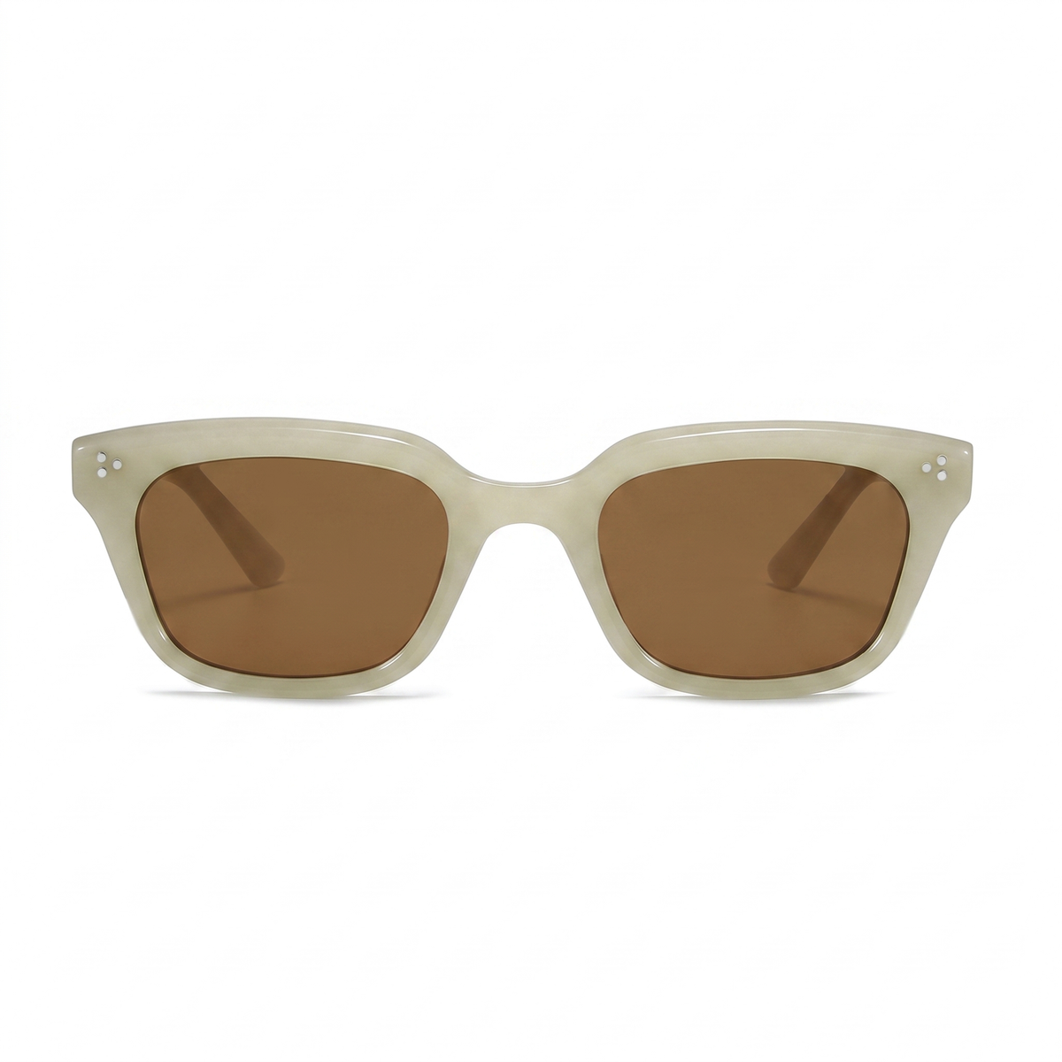 Oversized square sunglasses with a translucent light beige acetate frame and warm brown tinted lenses, shown against a plain white background.