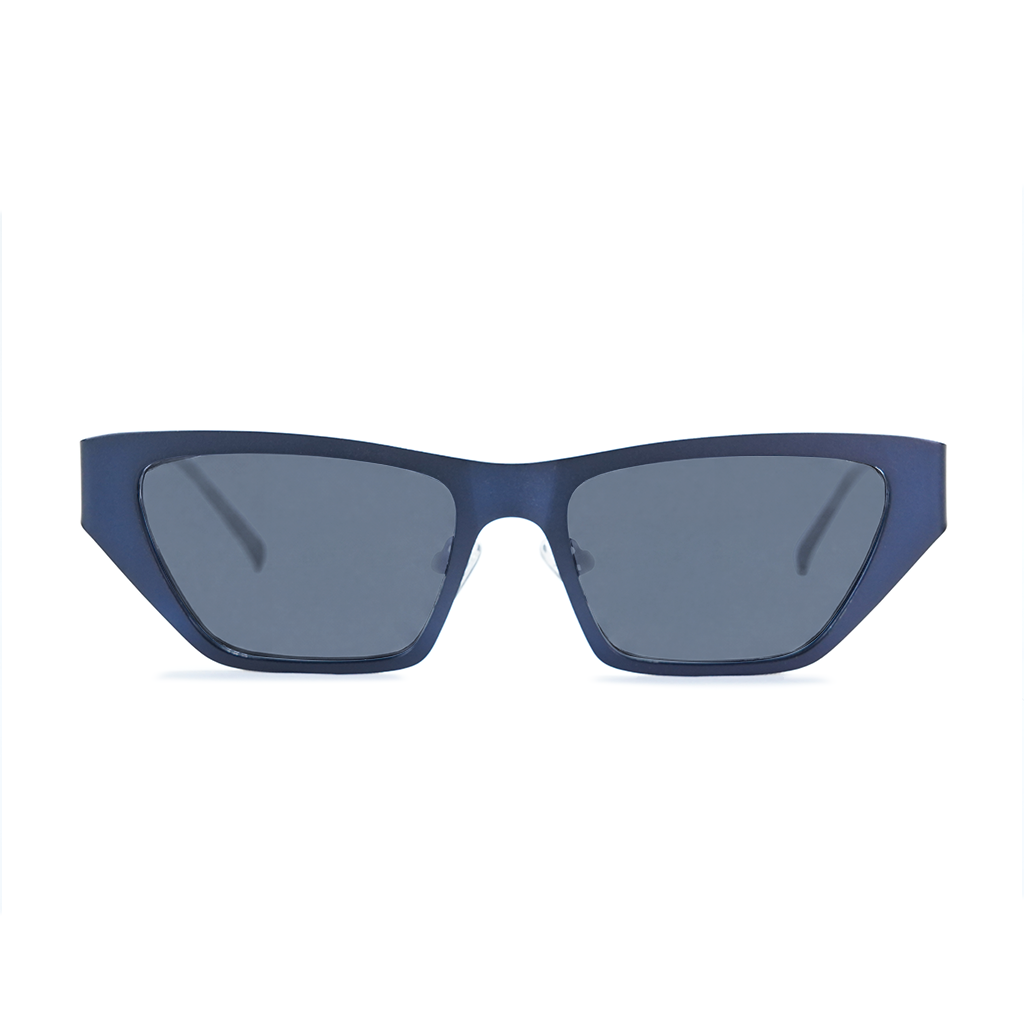 A pair of angular cat-eye sunglasses with a matte navy blue frame and dark gray lenses, shown against a plain white background.