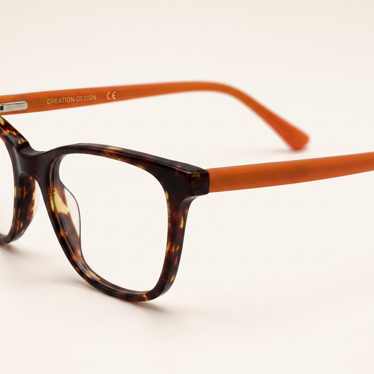Featuring a classic square silhouette in red-tortoiseshell acetate, finished with...