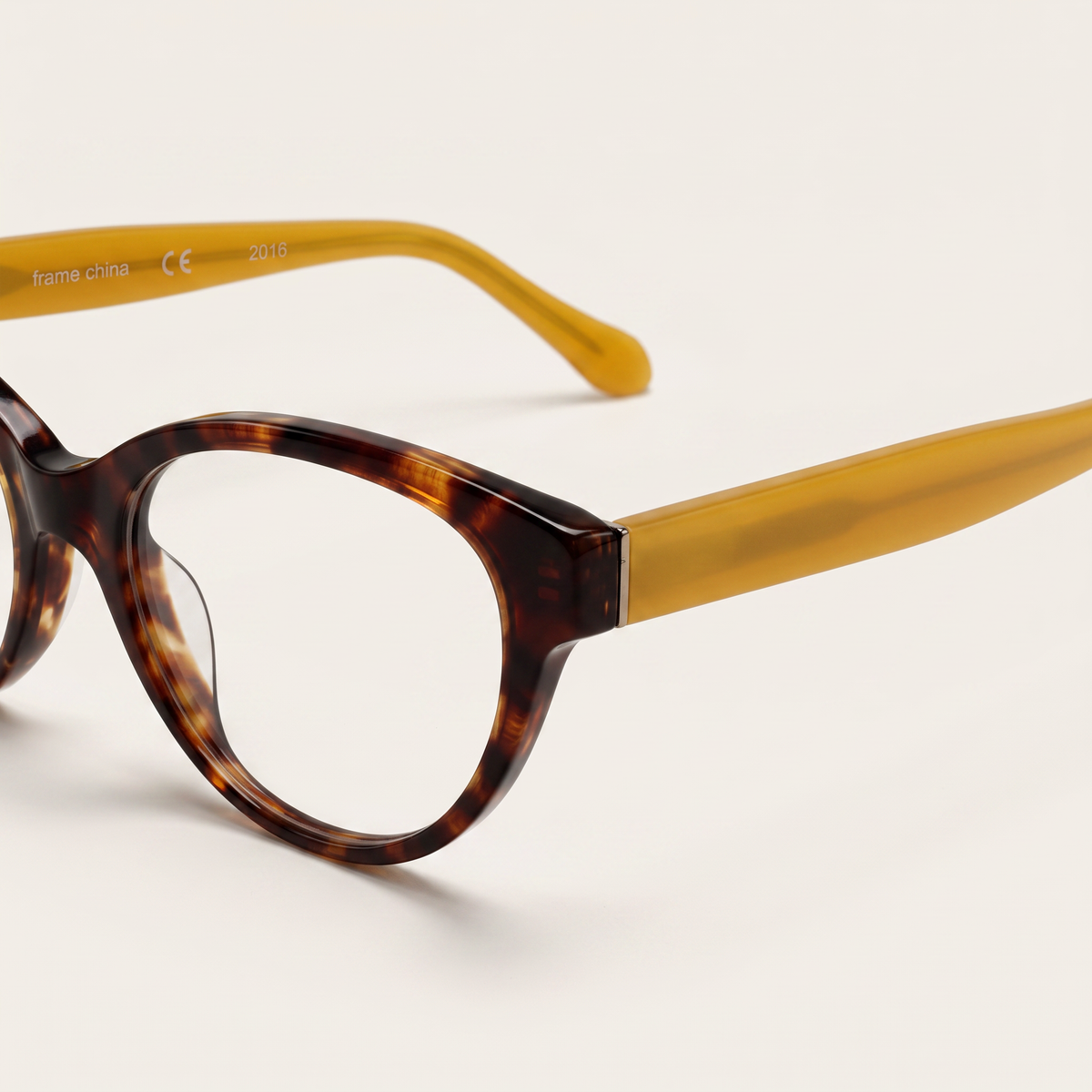 Featuring a classic cat-eye silhouette in tortoiseshell acetate, finished with...