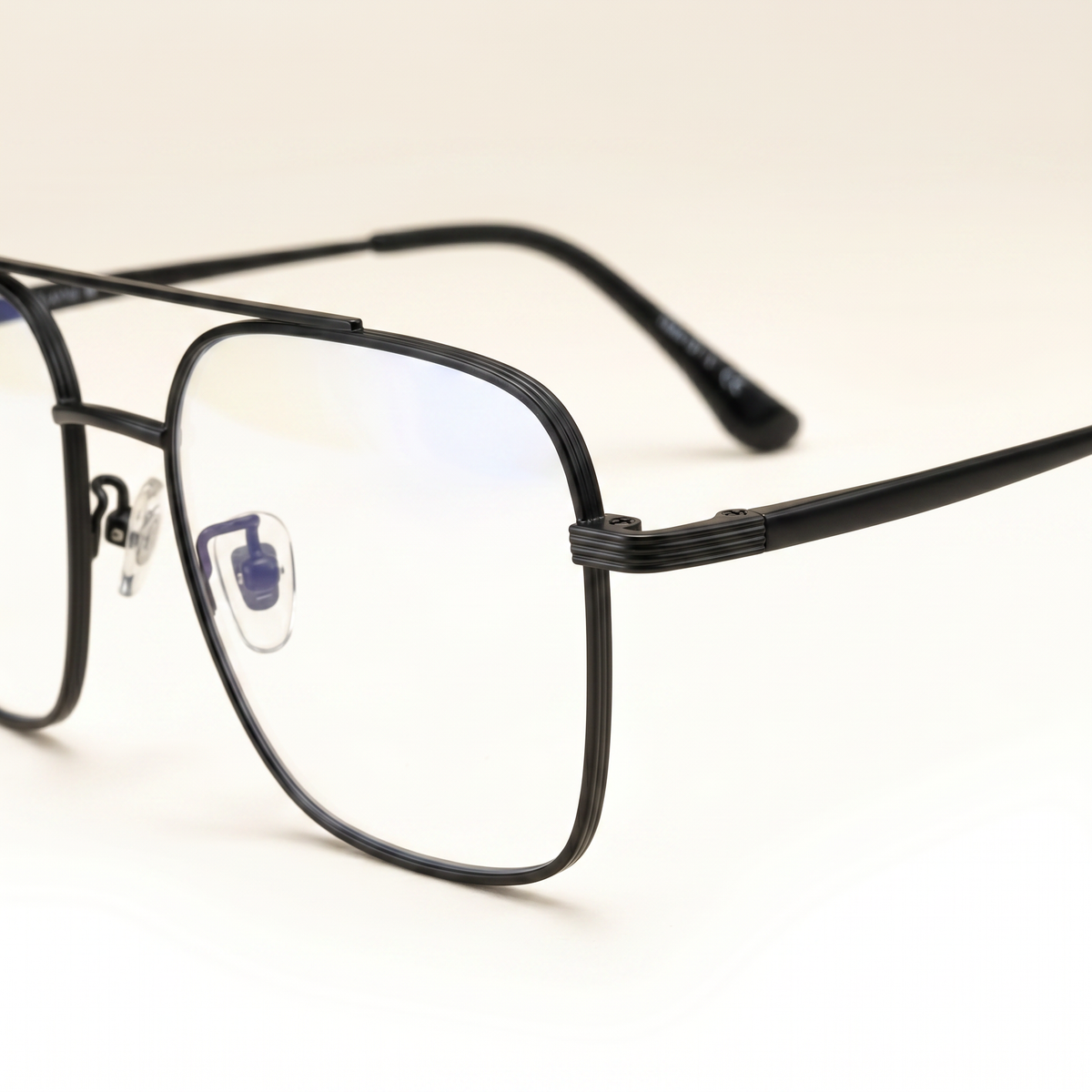 Featuring a classic aviator silhouette in black titanium, finished with...