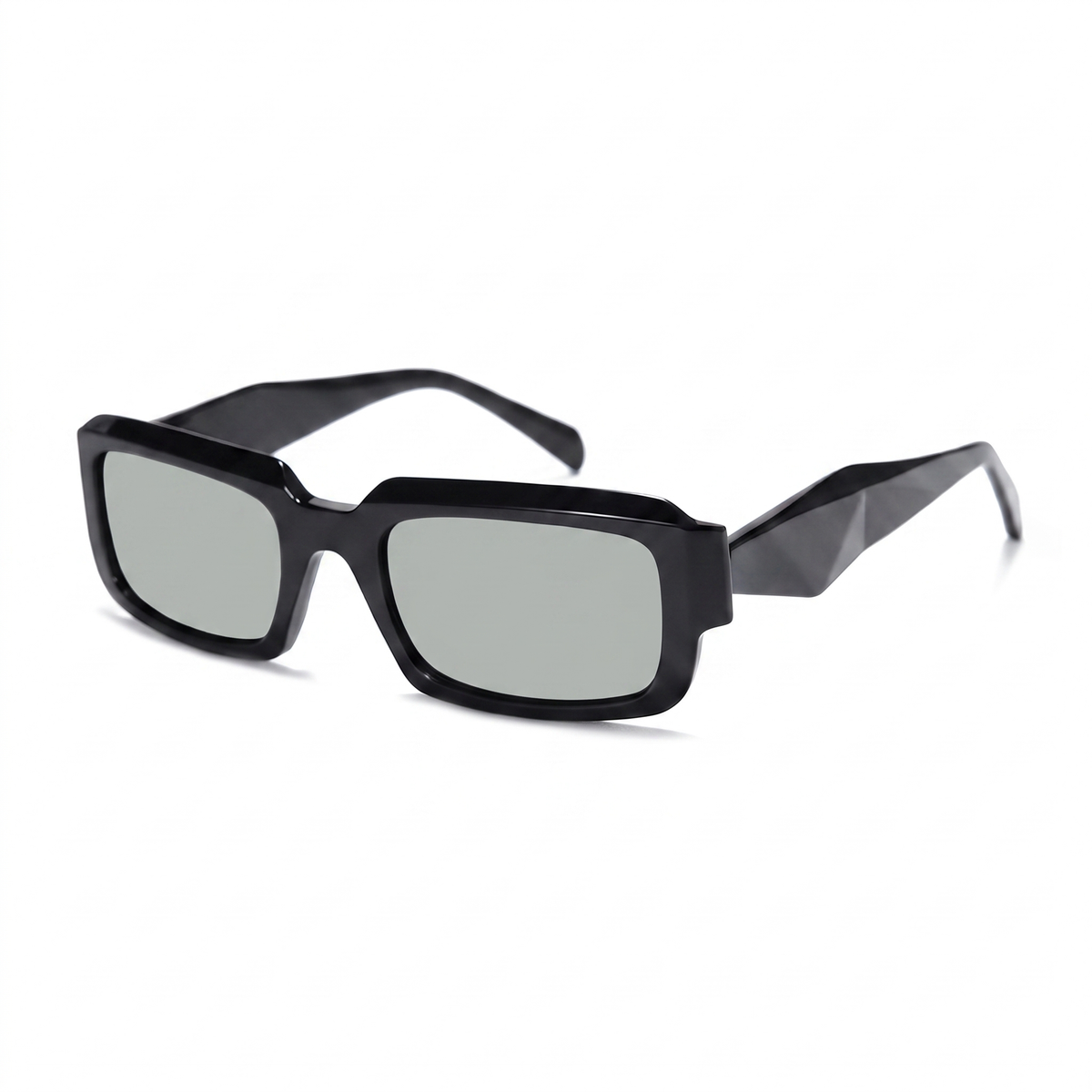 Sunglasses with tortoiseshell frame and gold accents on a white background