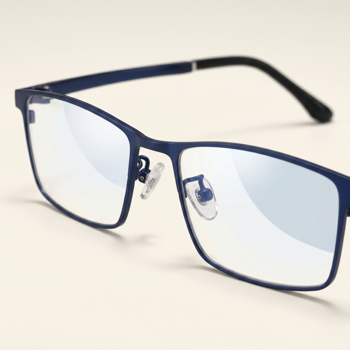 Featuring a classic rectangle silhouette in blue gray metal, finished...