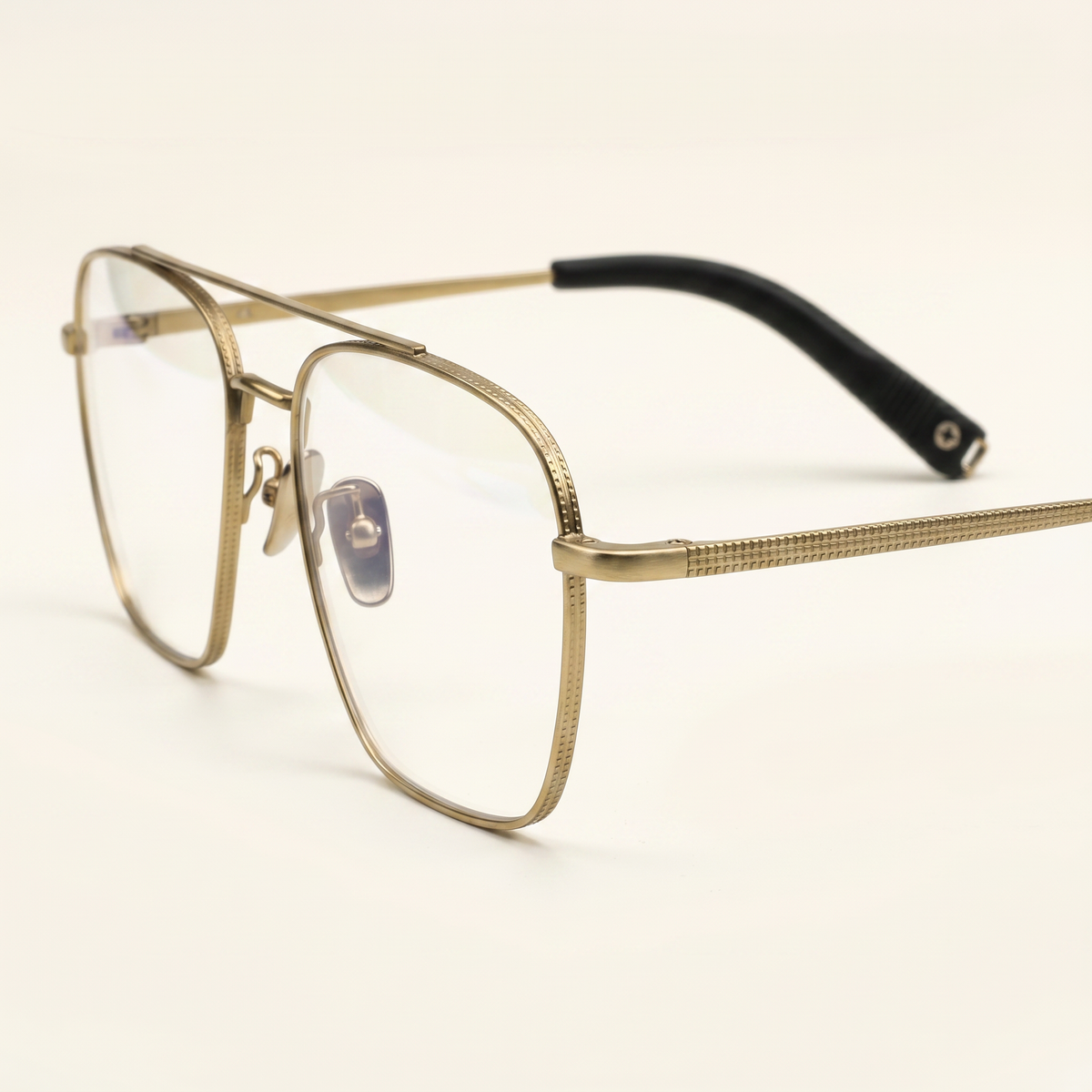 Featuring a classic square silhouette in beige gold titanium, finished...