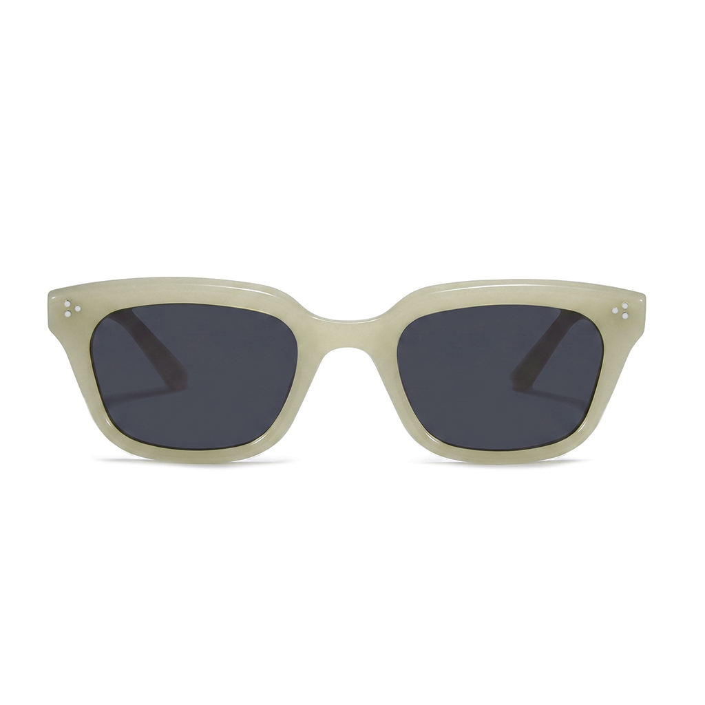 A pair of square sunglasses with a thick, matte light beige frame and dark gray lenses, shown against a plain white background.