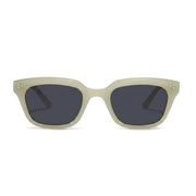 A pair of square sunglasses with a thick, matte light beige frame and dark gray lenses, shown against a plain white background.