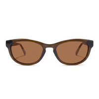 Oversized cat-eye sunglasses with translucent brown frames and warm brown lenses, shown against a plain white background.