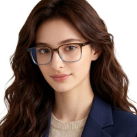 Woman wearing glasses with a neutral background