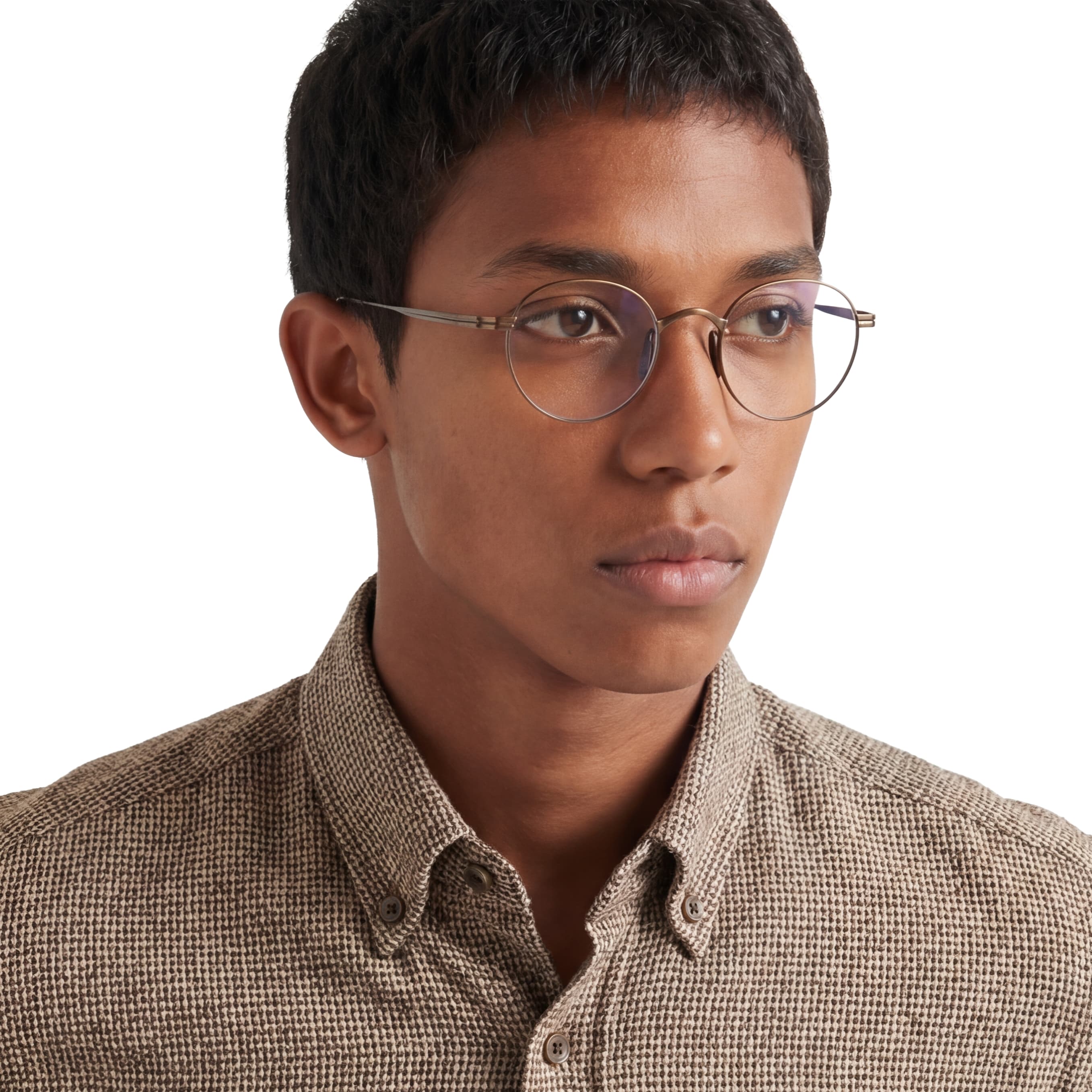 Man wearing glasses and a brown checkered shirt on a white background